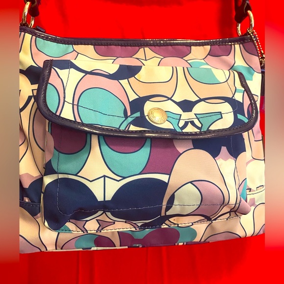 Nice coach multi color blues and purple. - Picture 1 of 8